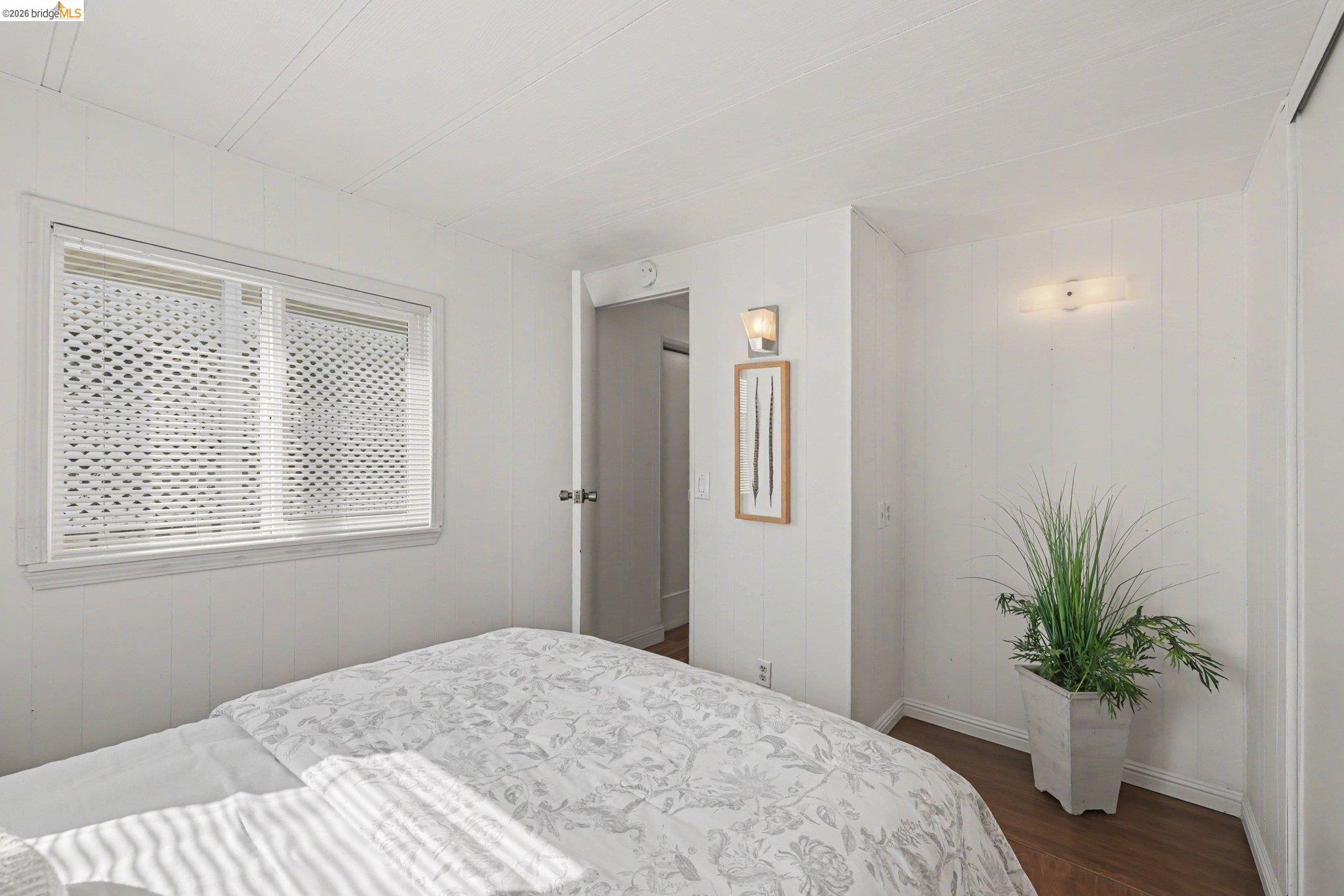36 Cayuga Street Oakley, CA 94561 - Photo 13 of 25 Bedroom with dark wood-type flooring and wood walls