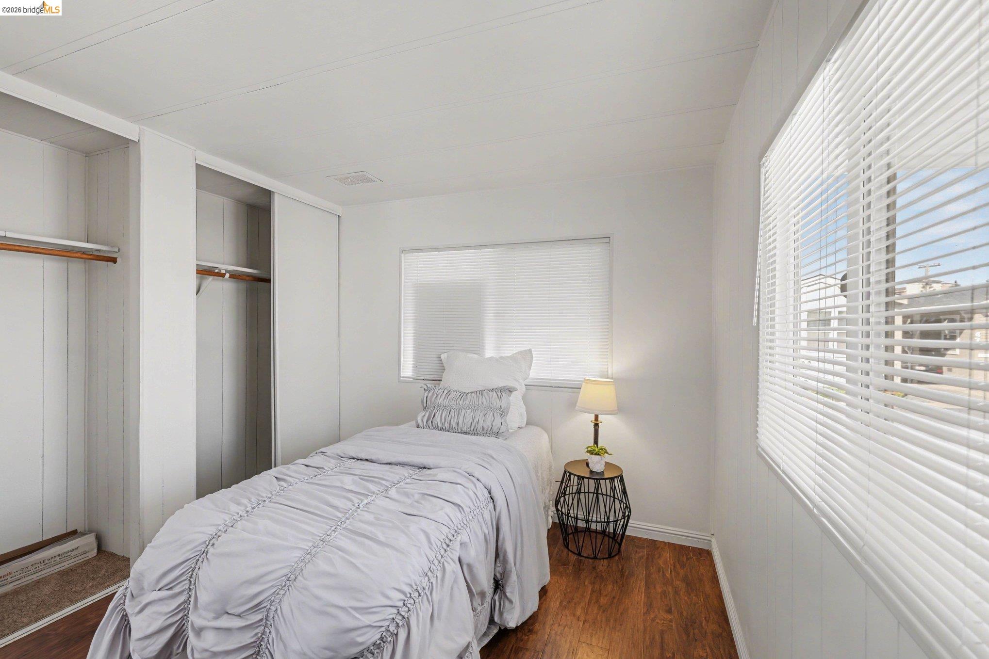 36 Cayuga Street Oakley, CA 94561 - Photo 14 of 25 Bedroom featuring dark wood-style floors and a closet