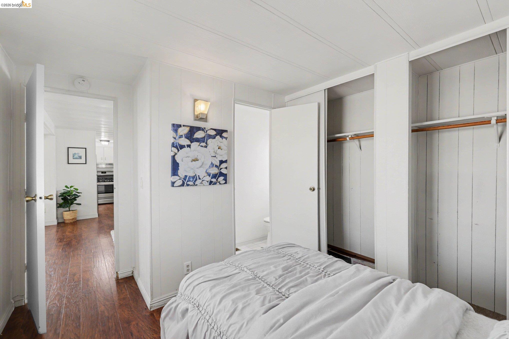 36 Cayuga Street Oakley, CA 94561 - Photo 15 of 25 Bedroom with dark wood-type flooring and multiple closets