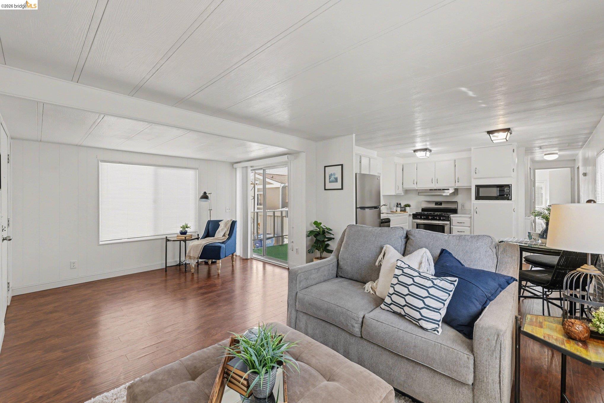 36 Cayuga Street Oakley, CA 94561 - Photo 6 of 25 Living room featuring wood-type flooring and beamed ceiling