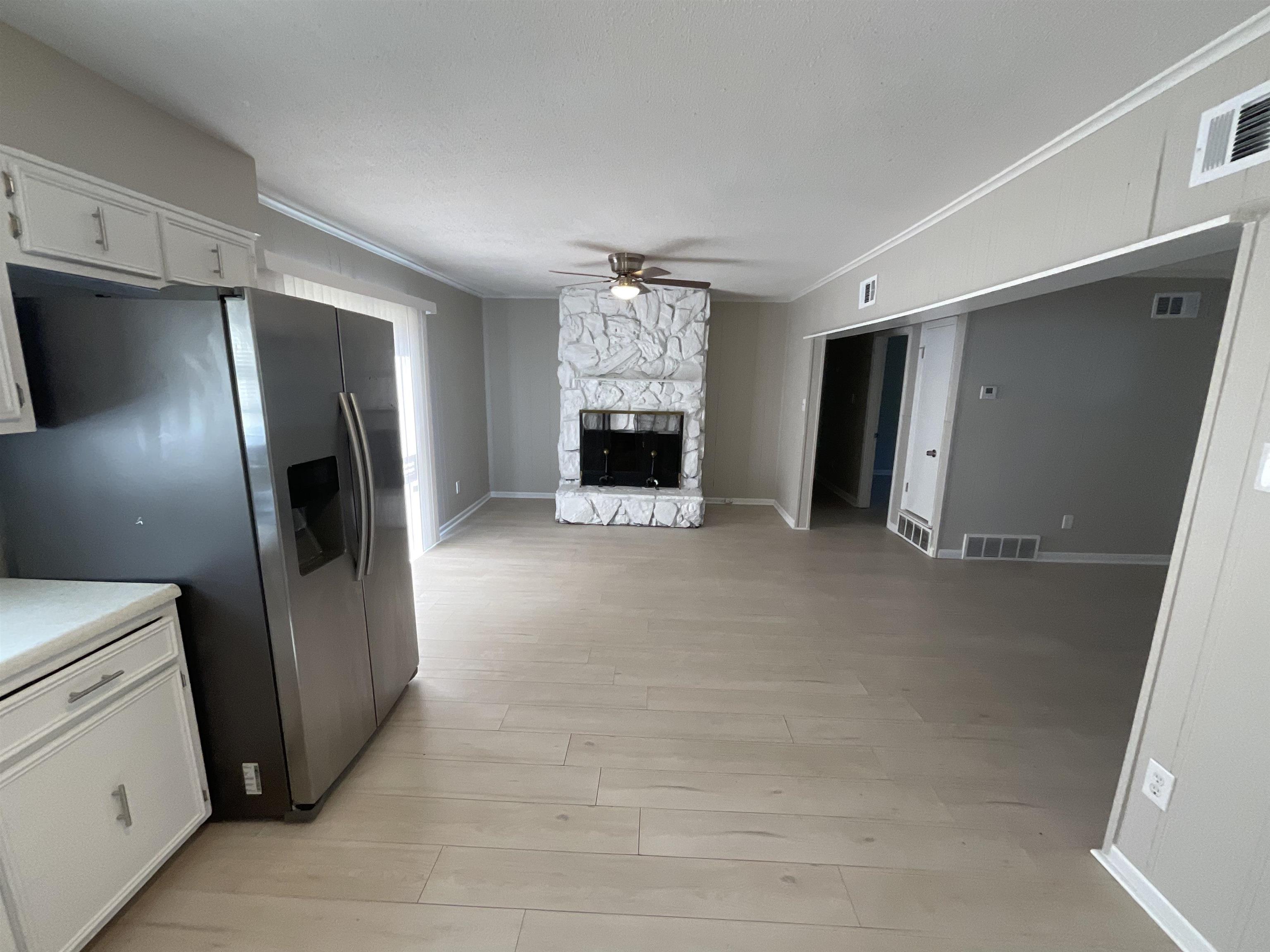 3193 Rendezvous Lane Memphis, TN 38118 - Photo 23 of 24 a view of a refrigerator in kitchen and livingroom