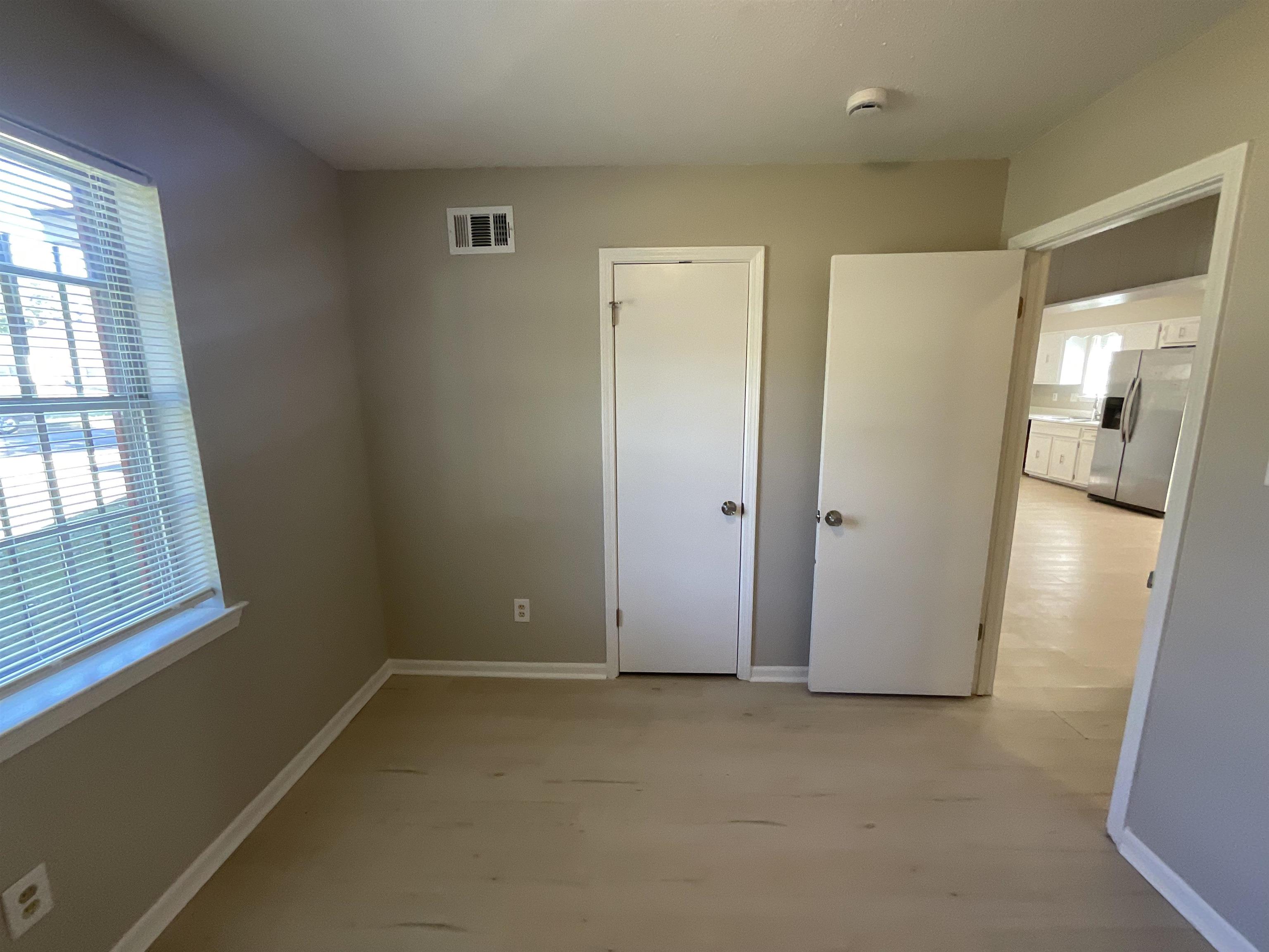 3193 Rendezvous Lane Memphis, TN 38118 - Photo 24 of 24 an empty room with windows and entrance