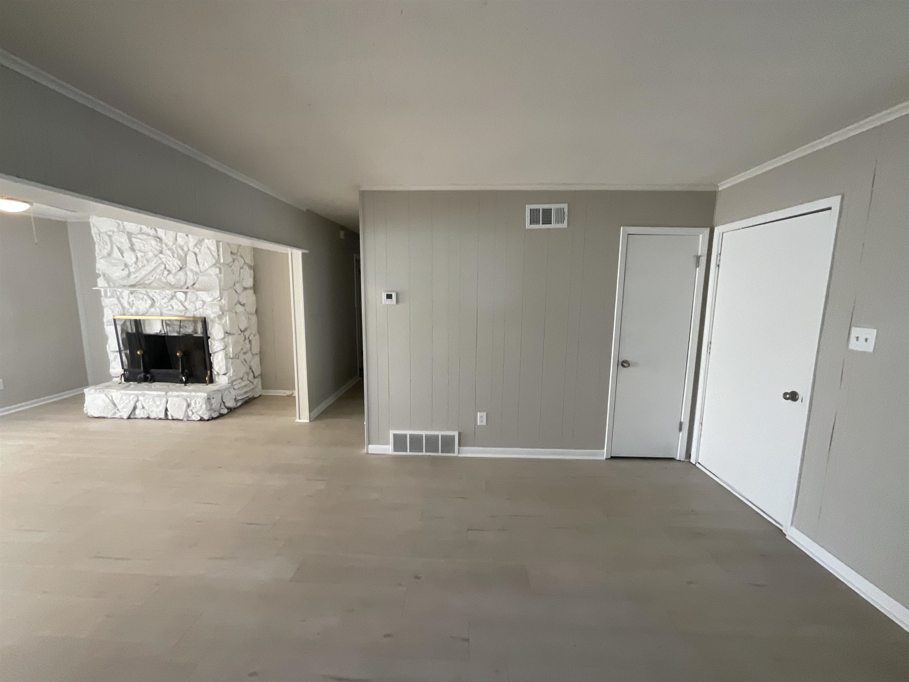 3193 Rendezvous Lane Memphis, TN 38118 - Photo 5 of 24 a view of an empty room with a fireplace