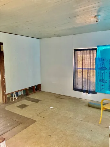 a view of a livingroom with couch