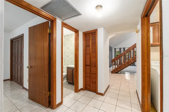 an aerial view of a house with a yard and a yard