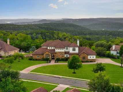 an aerial view of a house with a garden