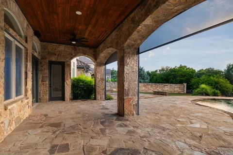 a view of a building with a large tree