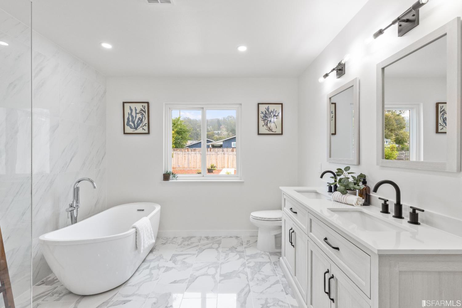 1139 Peralta Road Pacifica, CA 94044 - Photo 25 of 58 a bathroom with a sink a toilet and a tub