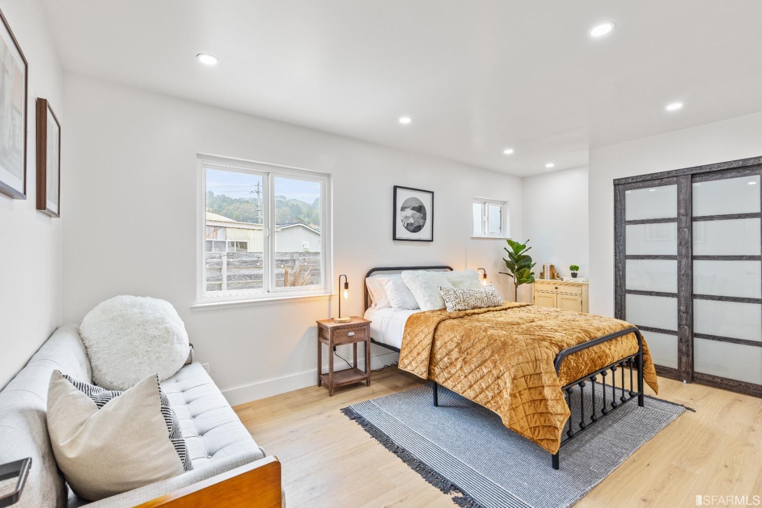 1139 Peralta Road Pacifica, CA 94044 - Photo 26 of 58 a bedroom with a large bed and a window