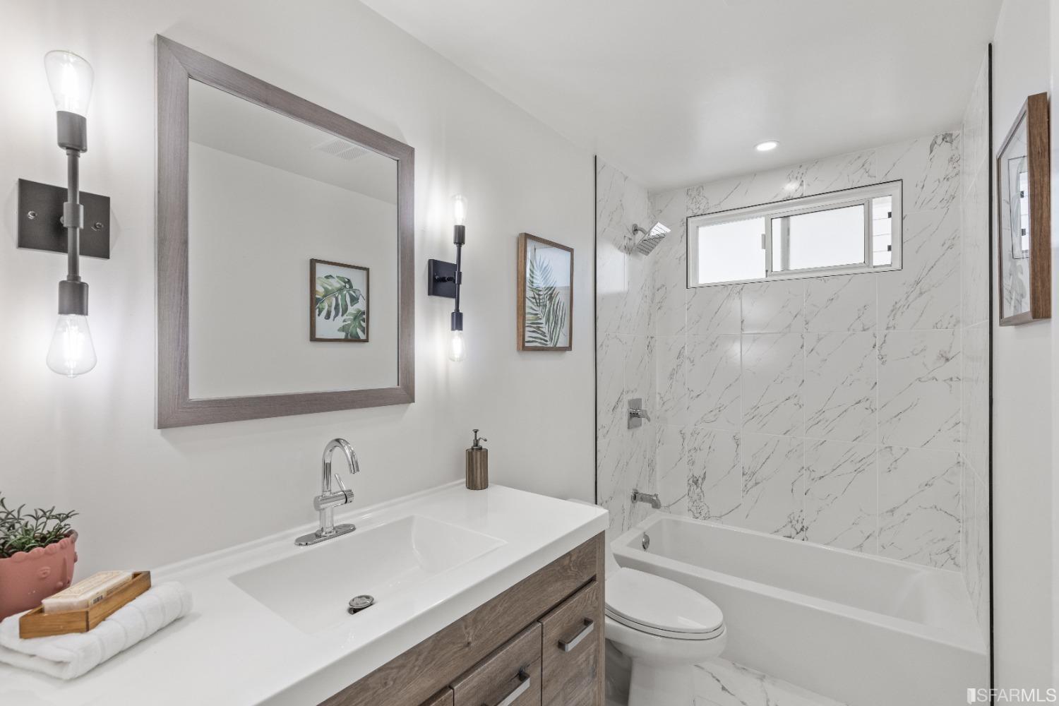 1139 Peralta Road Pacifica, CA 94044 - Photo 30 of 58 a bathroom with a sink toilet tub and shower