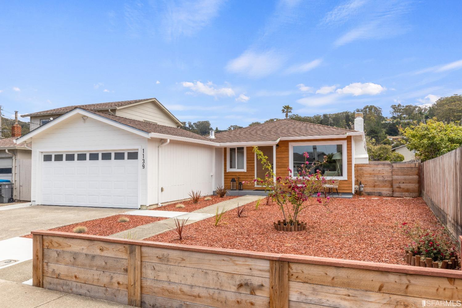 1139 Peralta Road Pacifica, CA 94044 - Photo 44 of 58 a front view of a house with garden