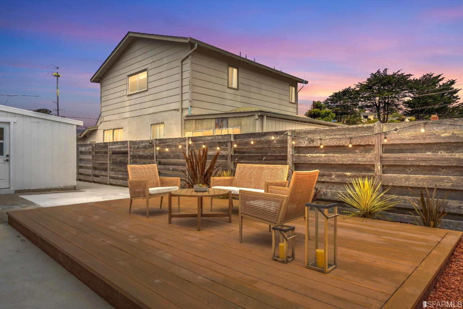 1139 Peralta Road Pacifica, CA 94044 - Photo 48 of 58 a view of a roof deck with table and chairs