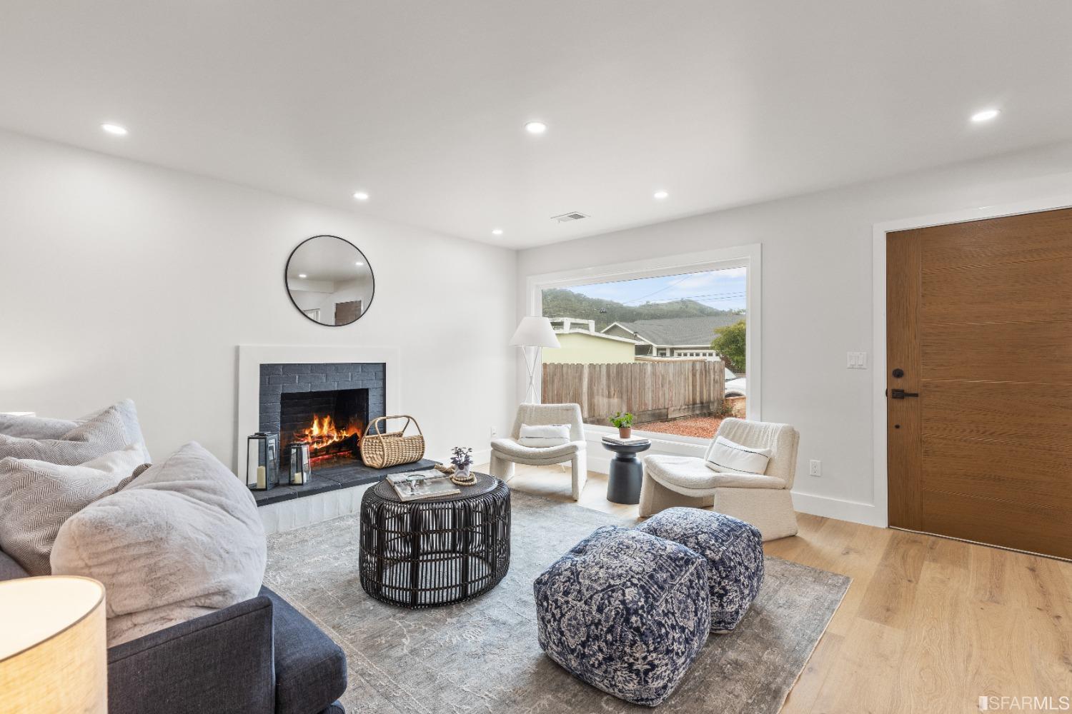 1139 Peralta Road Pacifica, CA 94044 - Photo 5 of 58 a living room with furniture and a fireplace