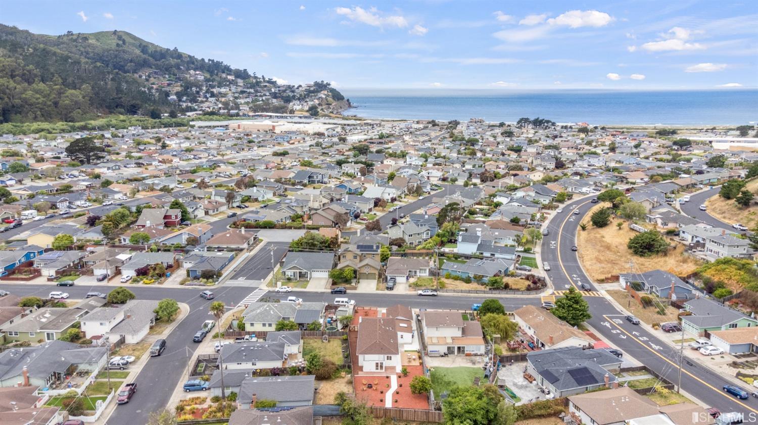 1139 Peralta Road Pacifica, CA 94044 - Photo 51 of 58 an aerial view of residential building and parking space