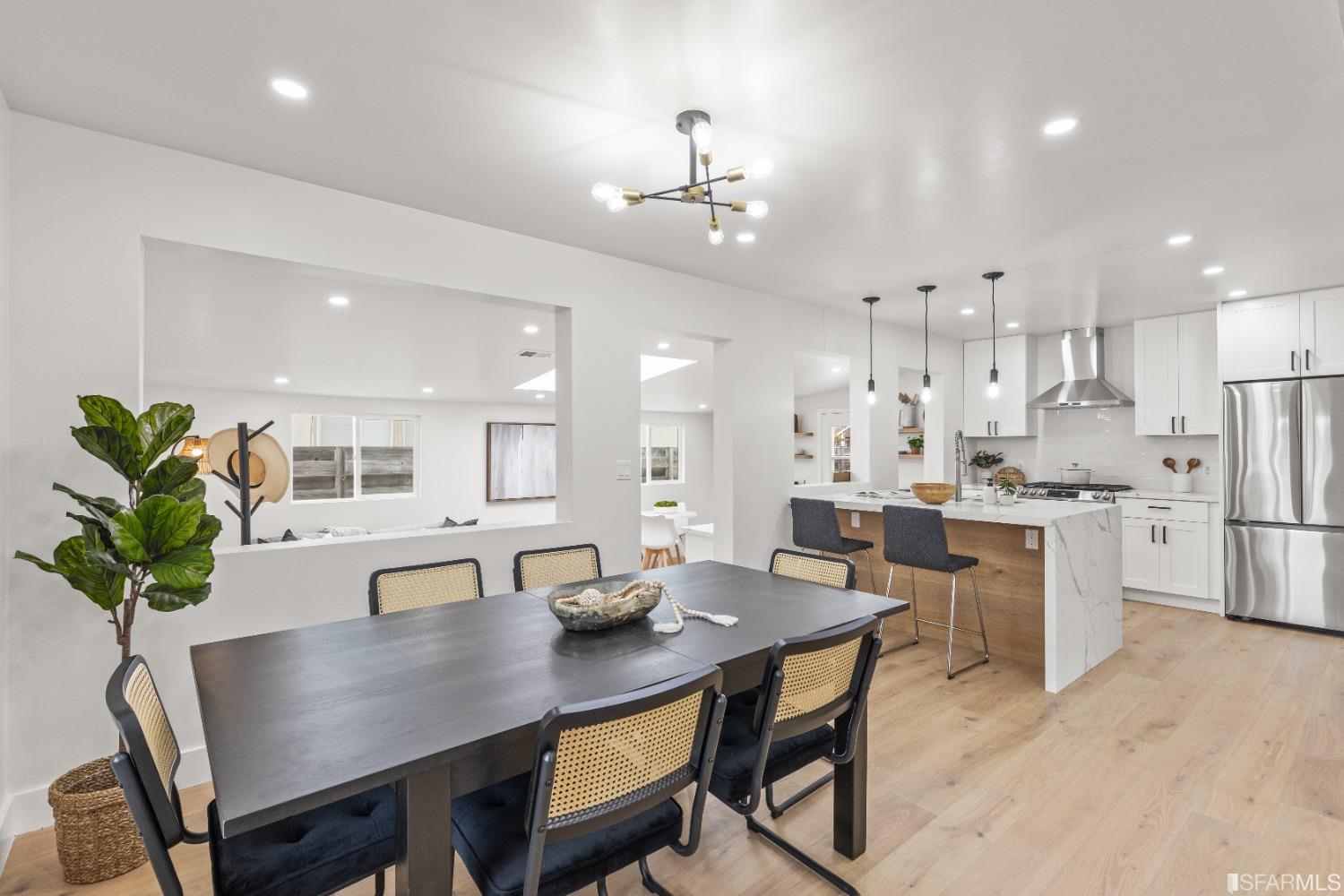 1139 Peralta Road Pacifica, CA 94044 - Photo 8 of 58 a view of a dining room with furniture and wooden floor