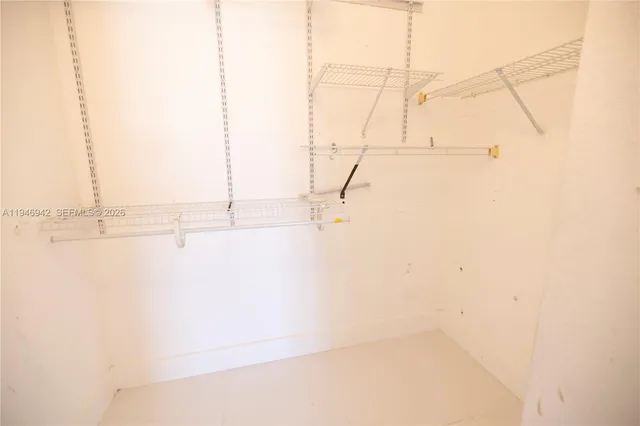 a bathroom with a shower and a toilet