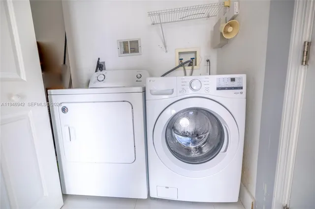 a view of a city from a corridor