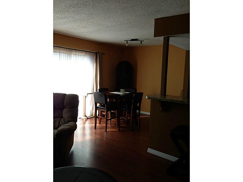 8801 West Sample Road, Unit 16 Coral Springs, FL 33065 - Photo 1 of 13 Dining Room