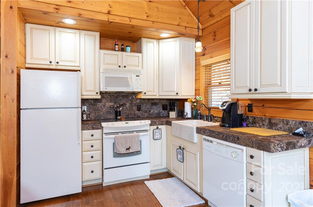 3448 Center Road Chester, SC 29706 - Photo 7 of 28 a kitchen with white cabinets and white appliances