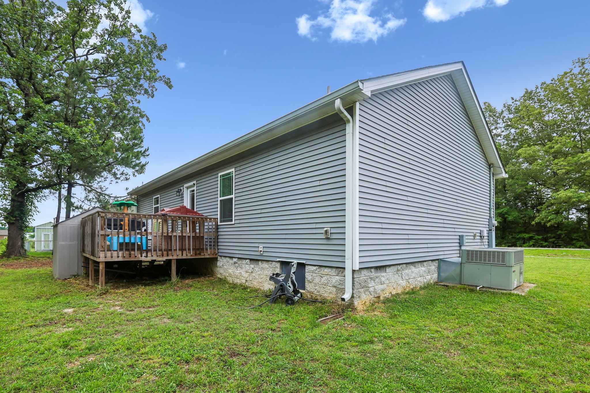 1546 South Spring Street Manchester, TN 37355 - Photo 36 of 53 a view of a house with a backyard