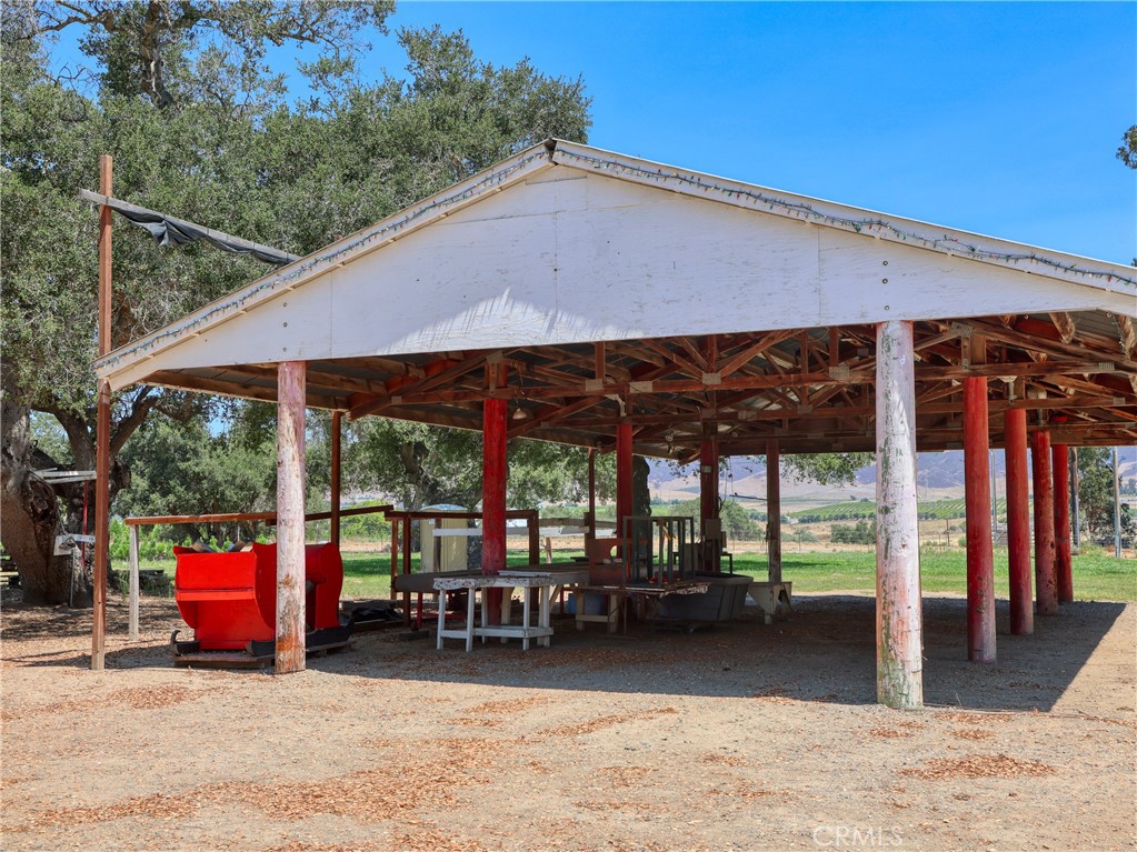 424 Bermuda Place Nipomo, CA 93444 - Photo 14 of 62 a patio with a table and chairs