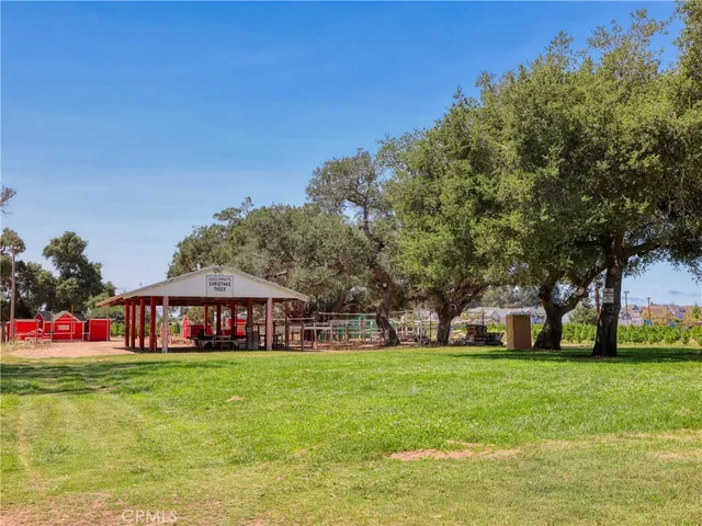 a view of swimming pool with an outdoor seating