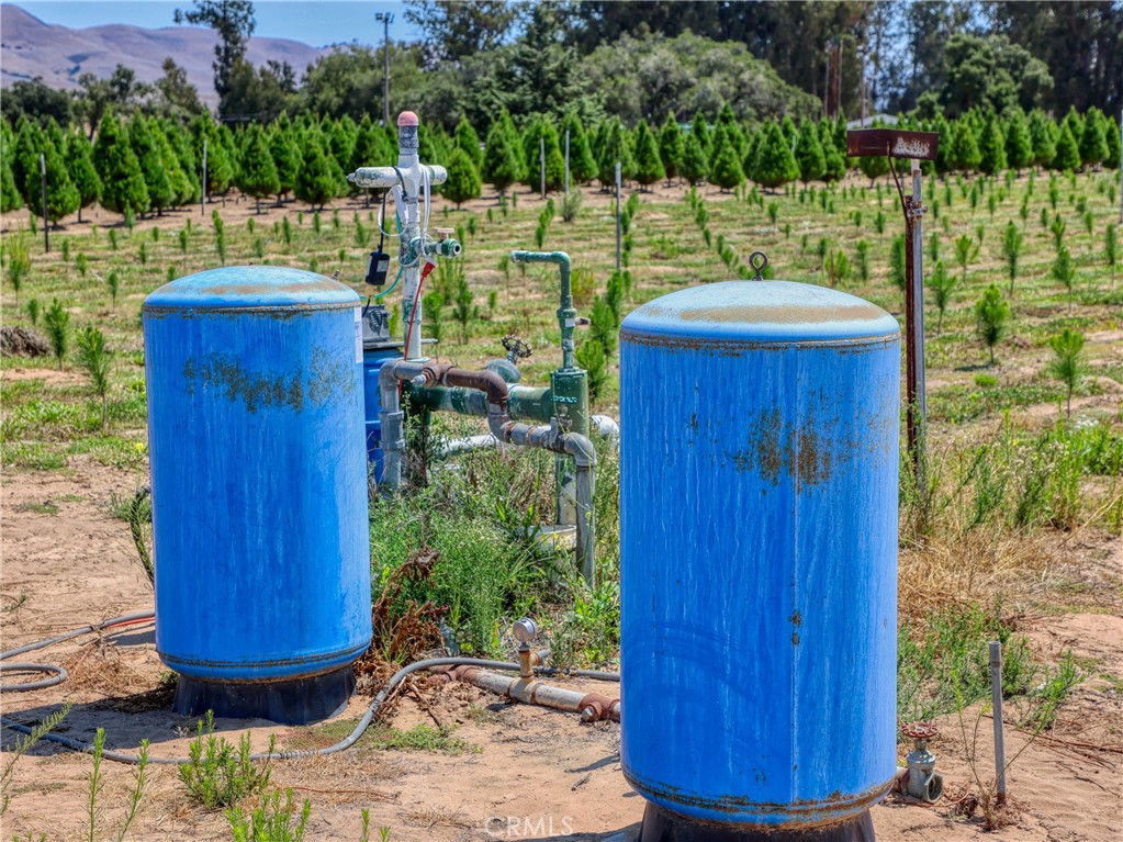 424 Bermuda Place Nipomo, CA 93444 - Photo 21 of 62 a view of yard with table and chairs and wooden fence