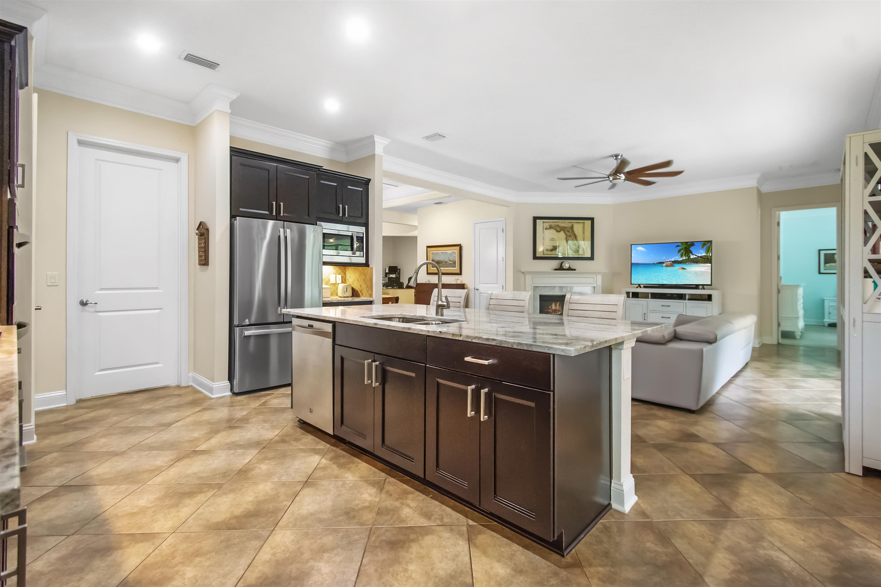 3461 Kings Road St. Augustine, FL 32086 - Photo 18 of 45 a kitchen with stainless steel appliances granite countertop a refrigerator and a sink