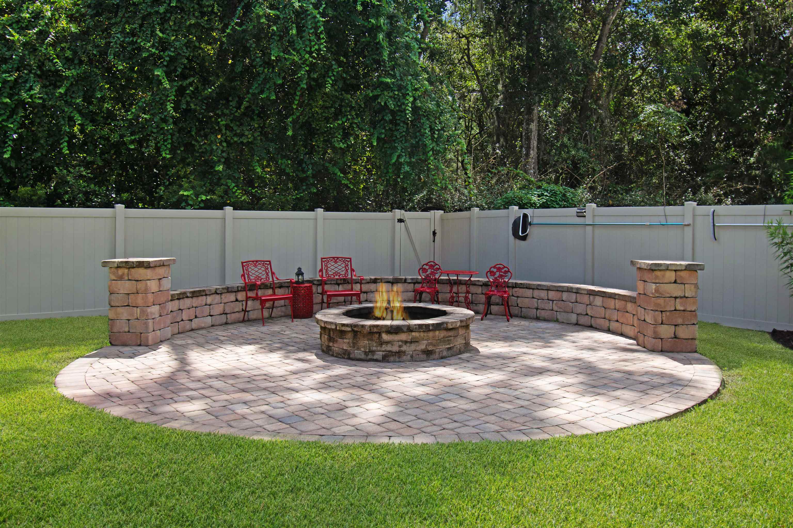 3461 Kings Road St. Augustine, FL 32086 - Photo 8 of 45 a view of a backyard with plants and patio