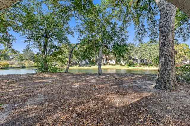 a view of lake with green space