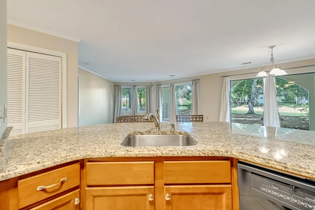a view of a swimming pool with a lounge chair