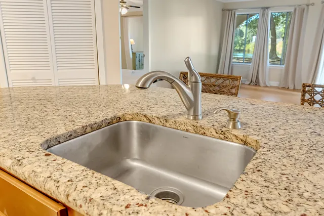 a view of a kitchen with a refrigerator