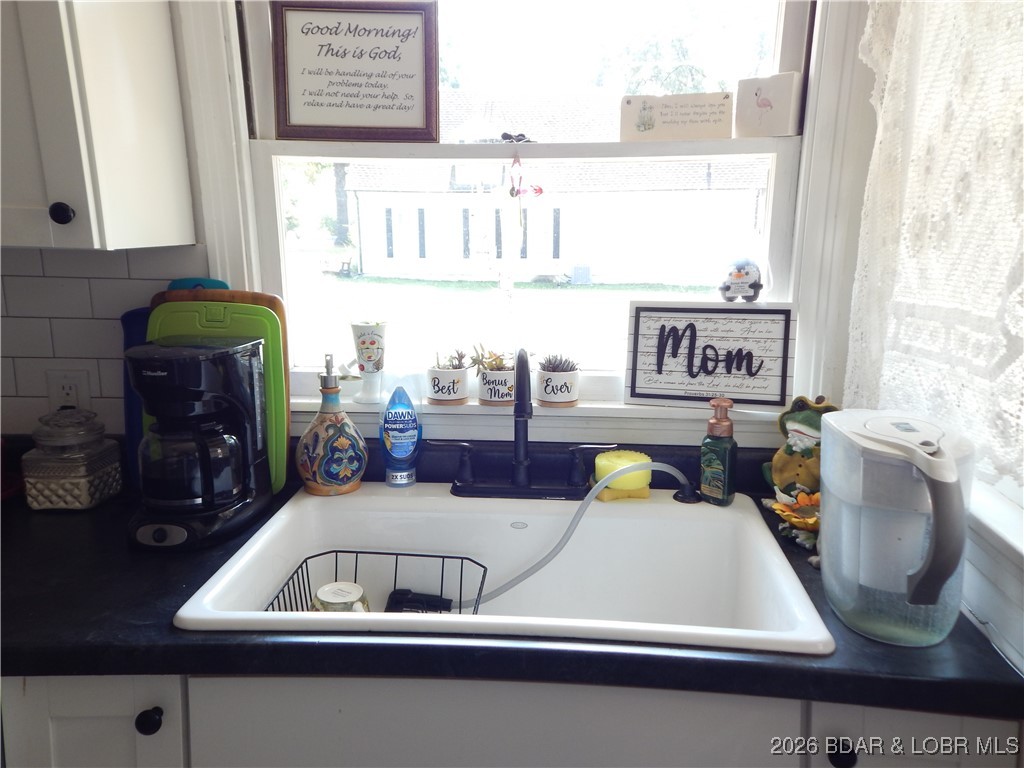 407 East Newton Street Eldon, MO 65026 - Photo 13 of 28 Porcelain Farm Sink.