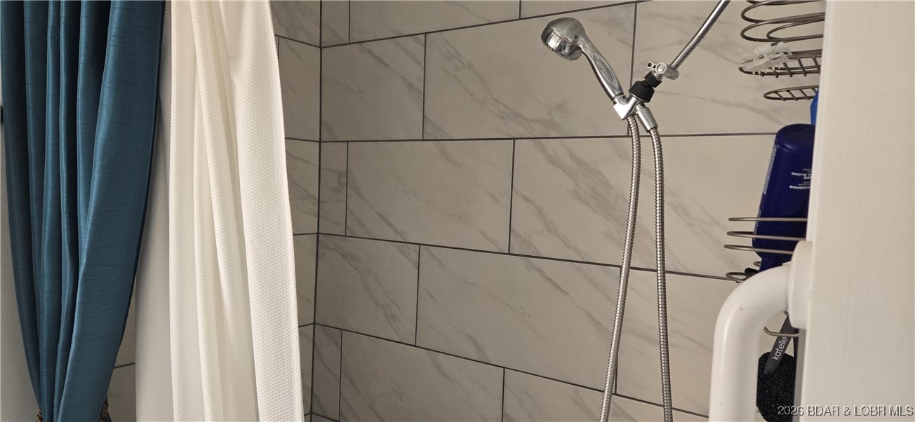 407 East Newton Street Eldon, MO 65026 - Photo 20 of 28 Tiled shower/tub