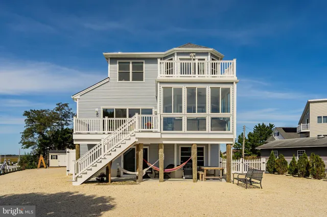 a view of a brick house with a large windows