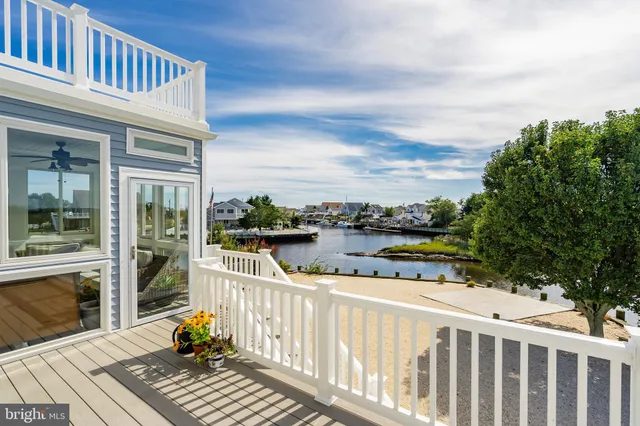 a kitchen with counter top space appliances and cabinets
