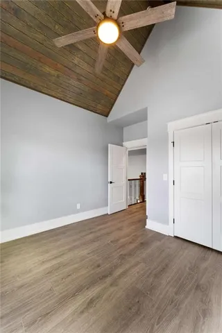 a bathroom with a sink toilet vanity and mirror
