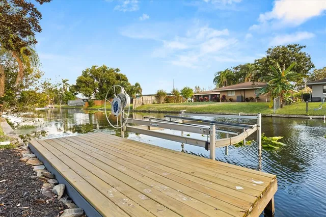 a view of house with outdoor space and sitting area