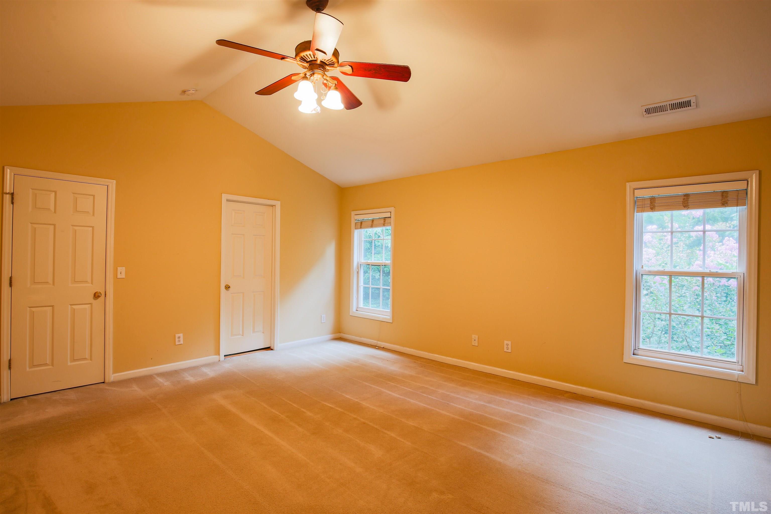 2208 Spruce Shadows Lane Raleigh, NC 27614 - Photo 19 of 26 a view of an empty room with a window