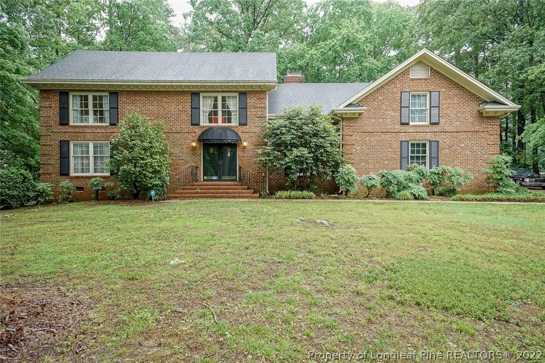 503 Queensferry Road Cary, NC 27511 - Photo 1 of 49 a front view of a house with a yard