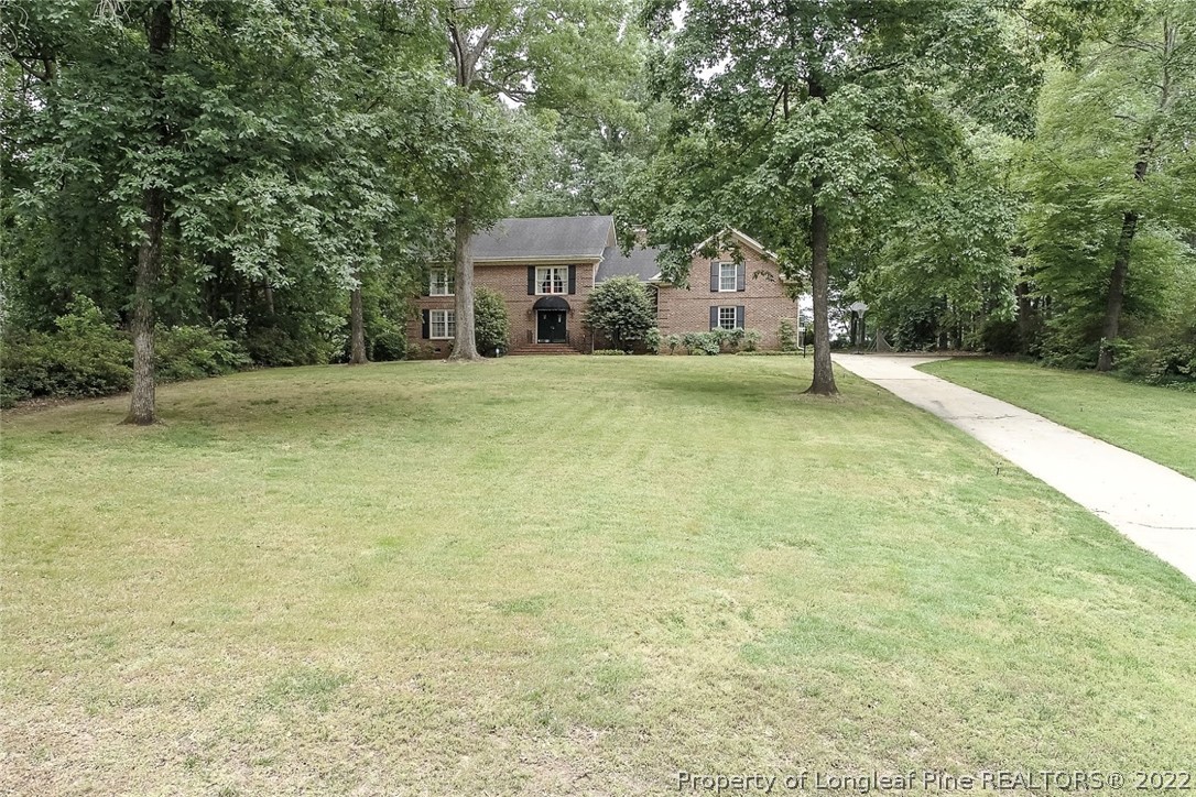 503 Queensferry Road Cary, NC 27511 - Photo 12 of 49 a house with trees in front of it