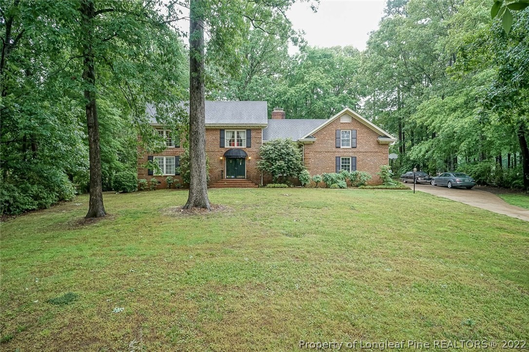 503 Queensferry Road Cary, NC 27511 - Photo 2 of 49 a view of a house with a yard and tree s