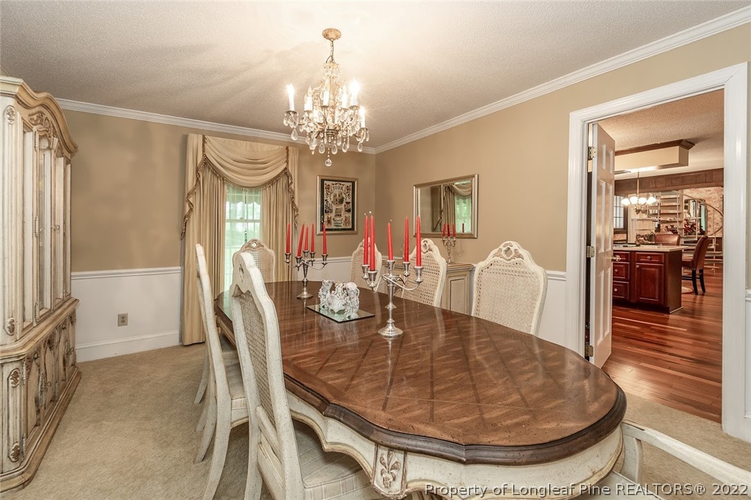503 Queensferry Road Cary, NC 27511 - Photo 27 of 49 a view of a dining room with furniture