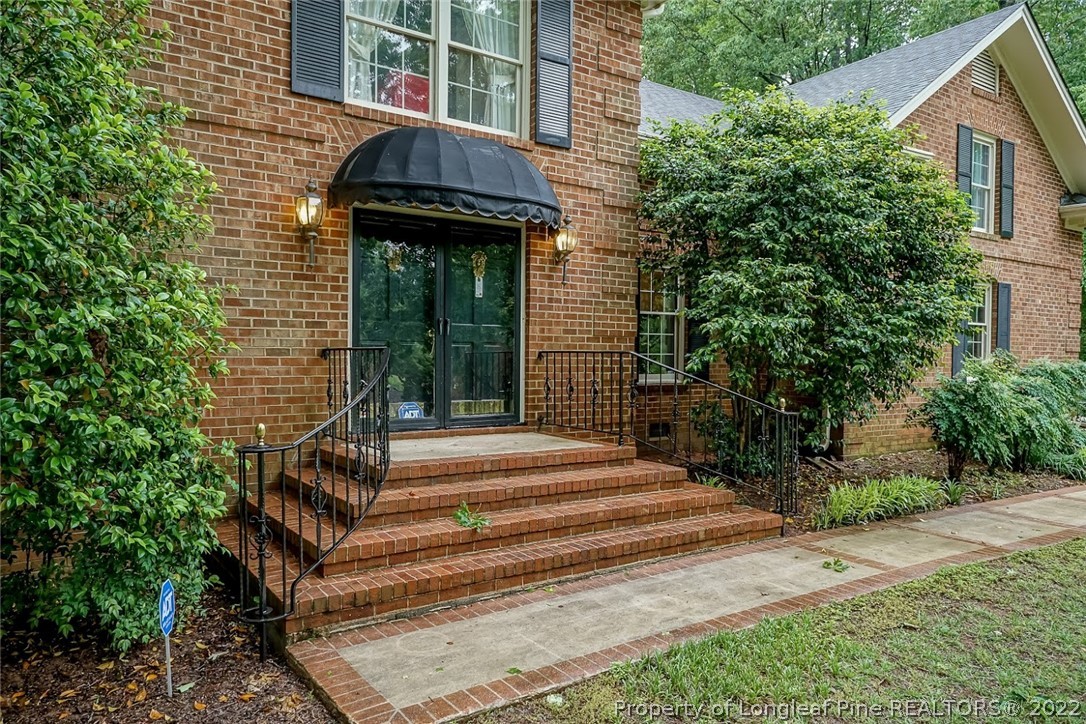 503 Queensferry Road Cary, NC 27511 - Photo 3 of 49 a view of a house with a small garden