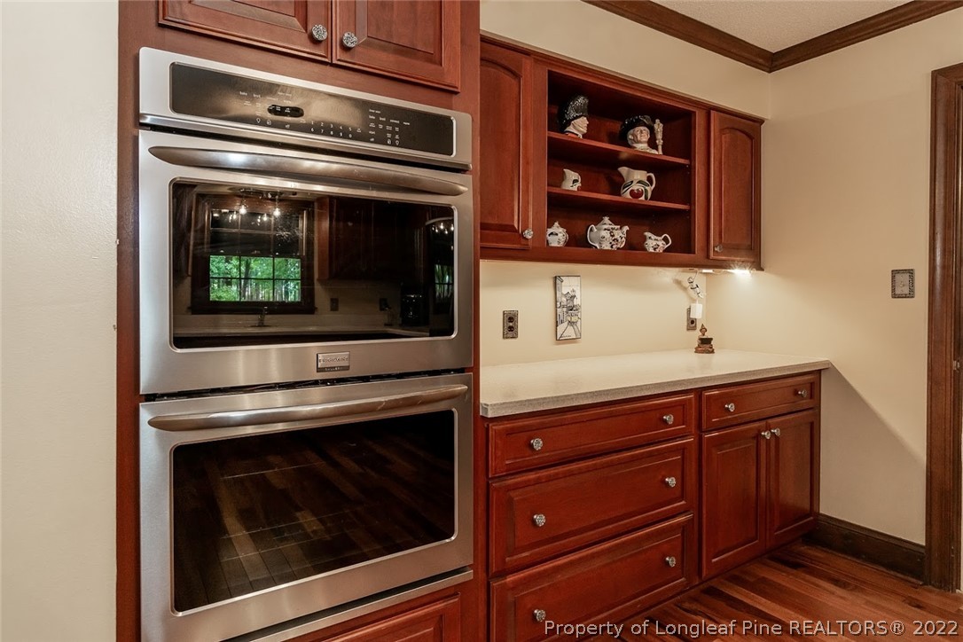 503 Queensferry Road Cary, NC 27511 - Photo 32 of 49 a kitchen with a stove and a microwave