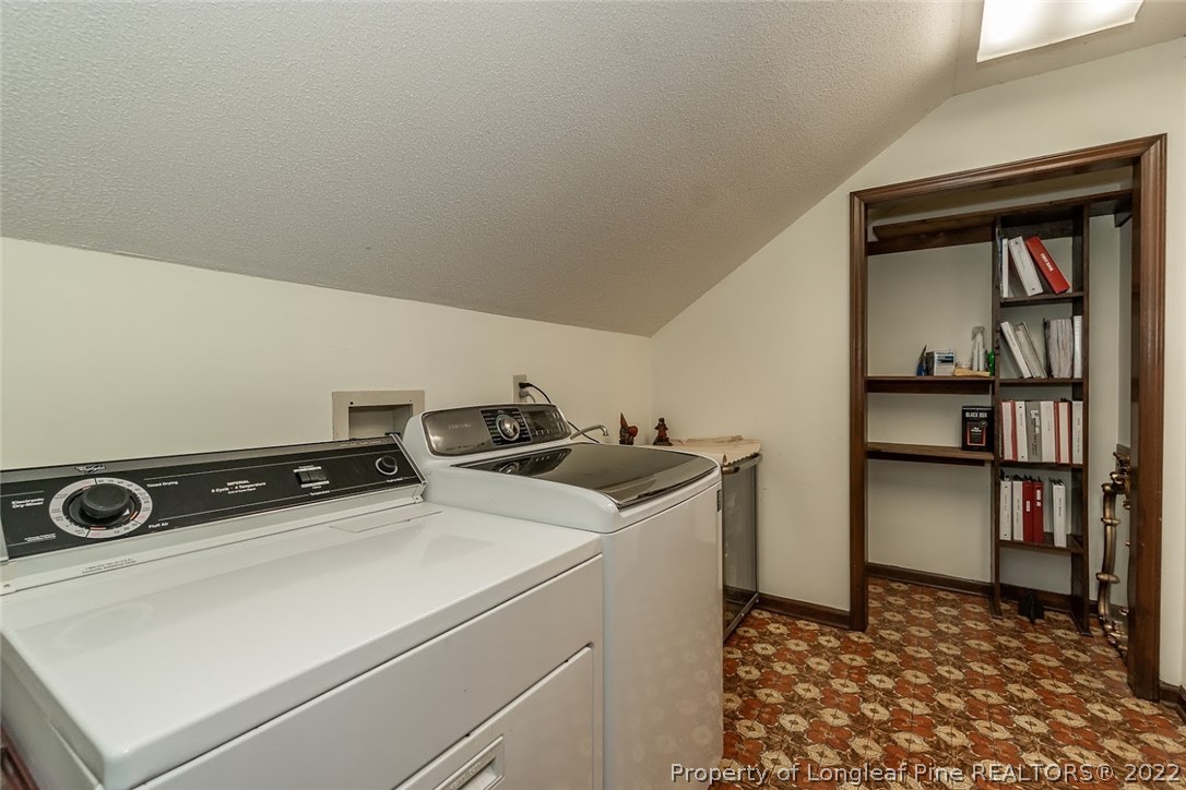 503 Queensferry Road Cary, NC 27511 - Photo 43 of 49 a utility room with dryer and washer