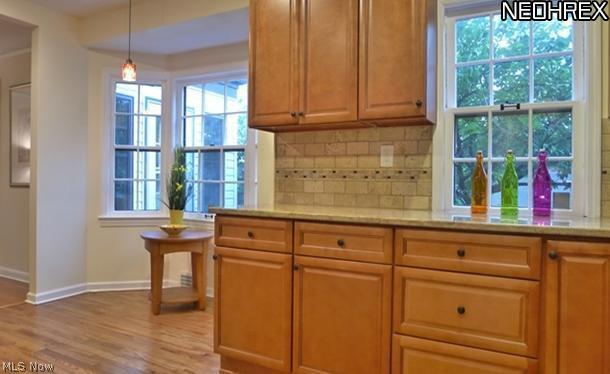 2555 Fenwick Road Cleveland, OH 44118 - Photo 10 of 25 Sunny Eat-In Kitchen Area with Beautiful hardwood flooring