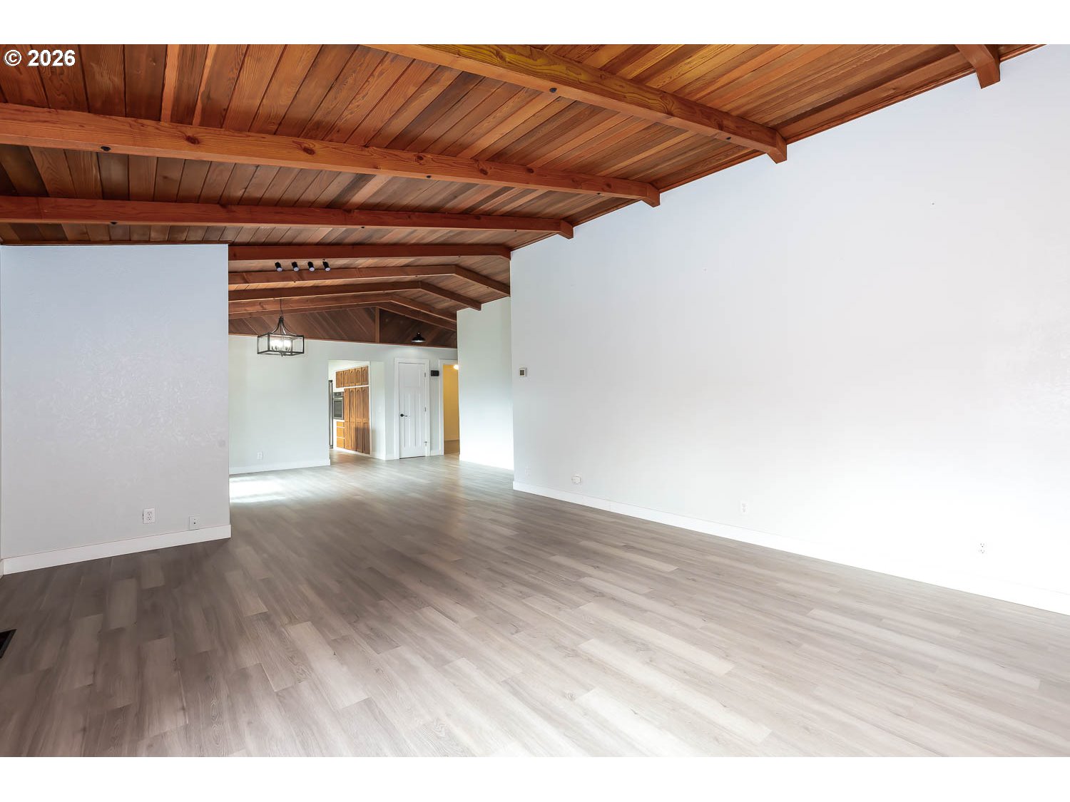 48187 McFarland Road Oakridge, OR 97463 - Photo 17 of 41 a view of empty room with wooden floor