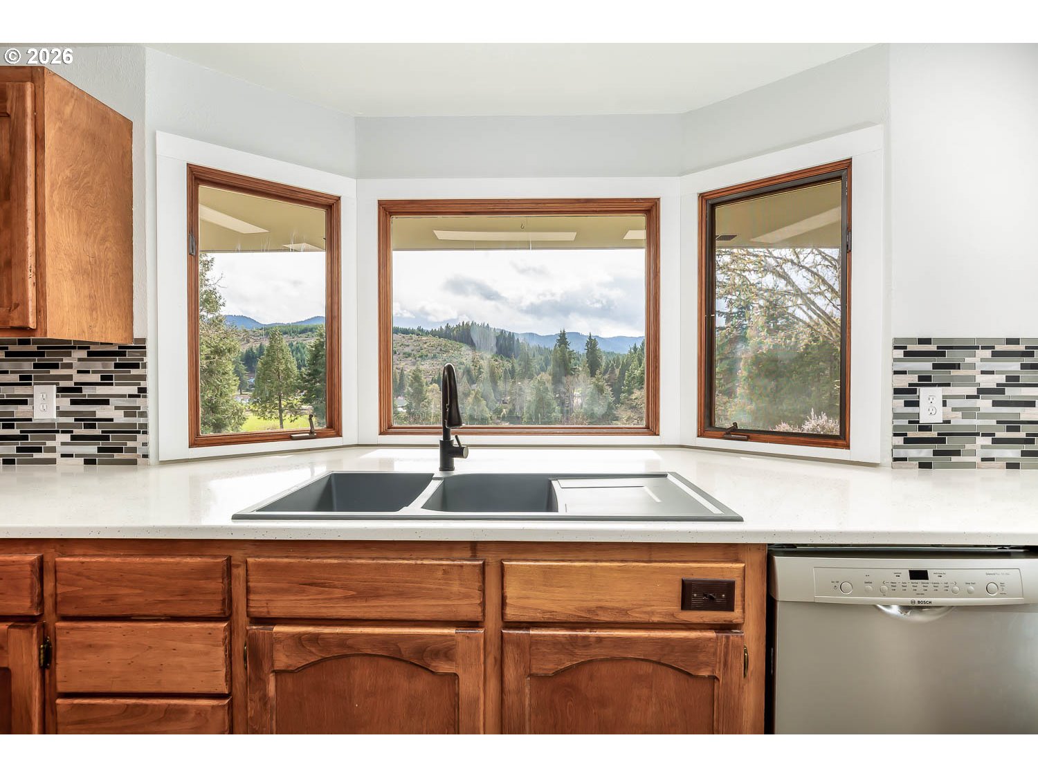 48187 McFarland Road Oakridge, OR 97463 - Photo 22 of 41 a sink sitting next to a window