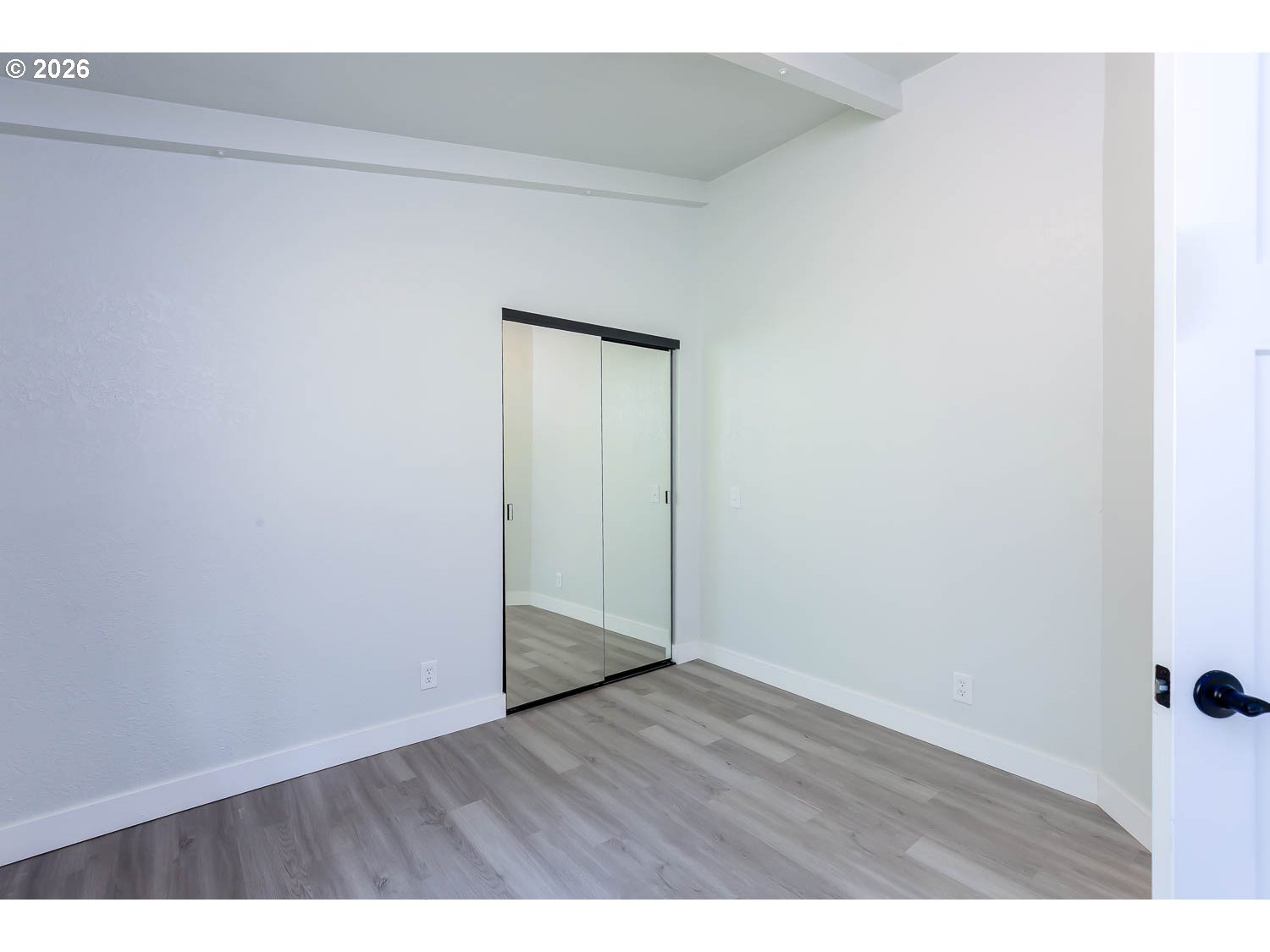 48187 McFarland Road Oakridge, OR 97463 - Photo 29 of 41 a view of an empty room with wooden floor